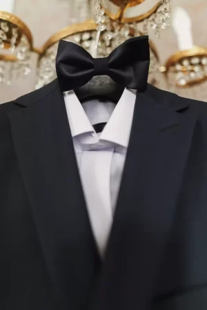 stylish-black-suit-with-white-shirt-and-bow-tie-on-2026-01-09-06-49-40-utc